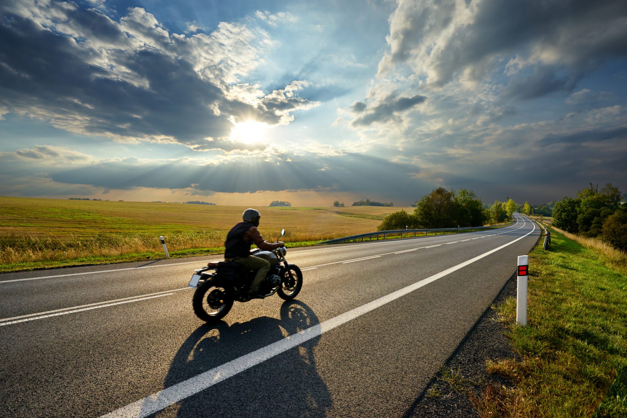 Uninsured and Underinsured Motorist Coverage - Motorcyclist on the Open Road